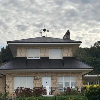 Arreglo de tejados de una casa